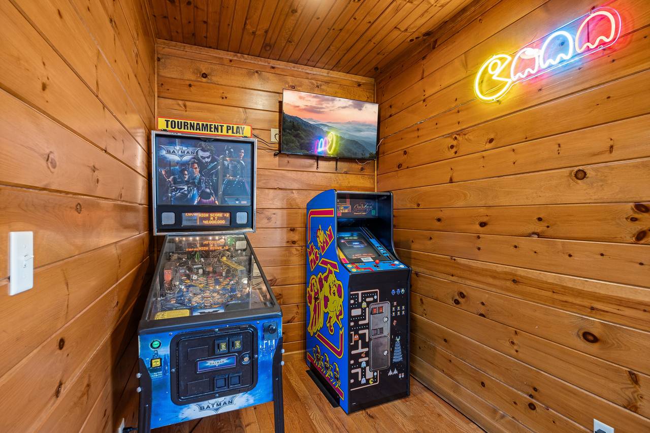 Game room with pool table, pinball, multi-cade, & air hockey. Game room with pool table, pinball, multi-cade, & air hockey.