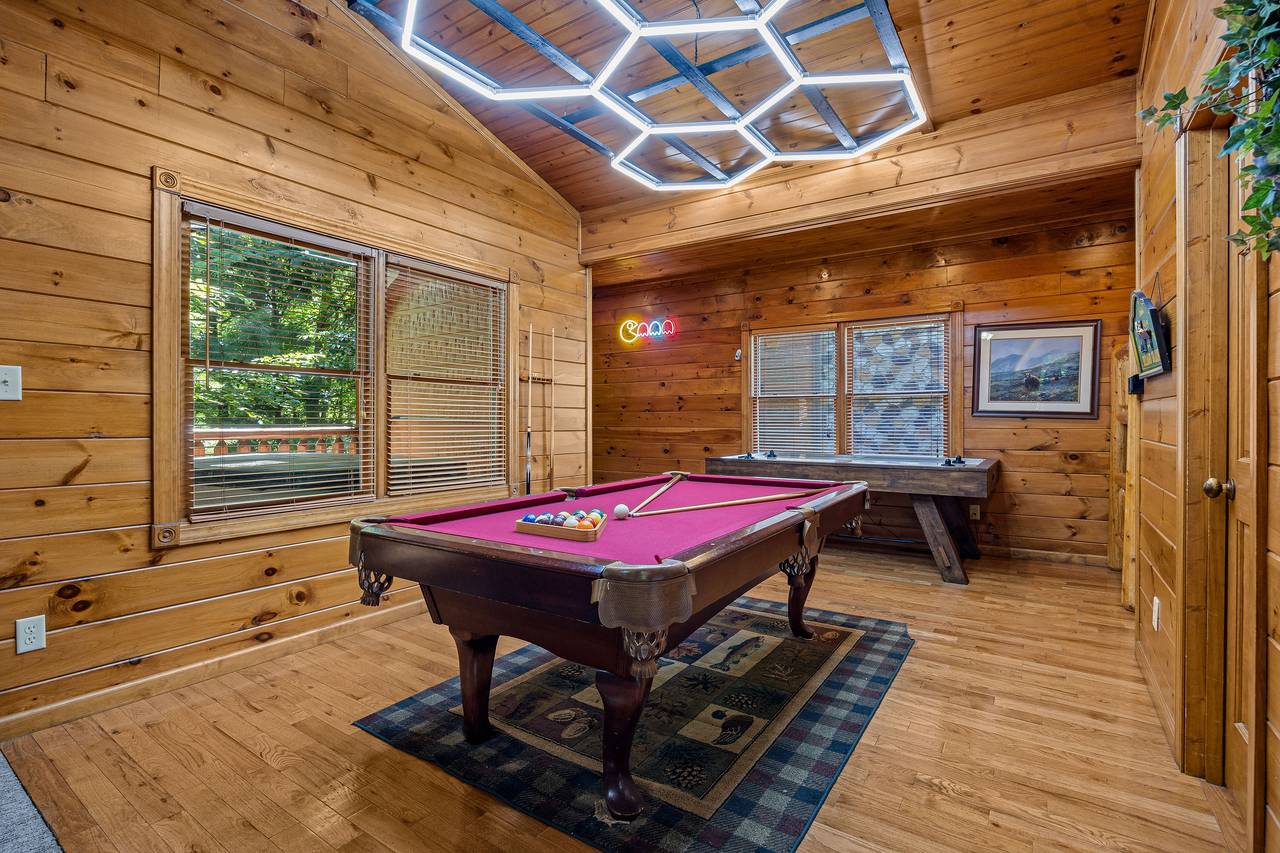 Game room with pool table, pinball, multi-cade, & air hockey. Game room with pool table, pinball, multi-cade, & air hockey.