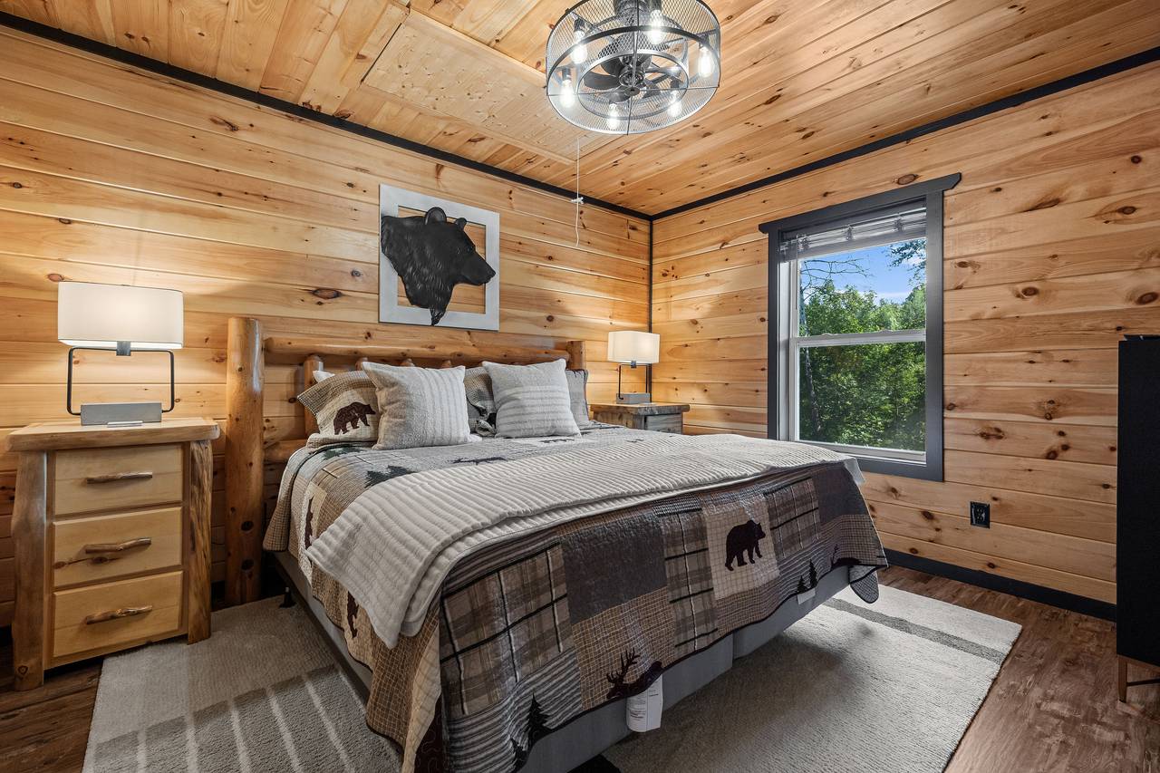 Entry level king bed with TV and shared full bath Entry level king bed with TV and shared full bath