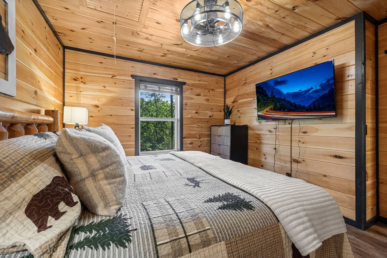 Entry level king bed with TV and shared full bath Entry level king bed with TV and shared full bath