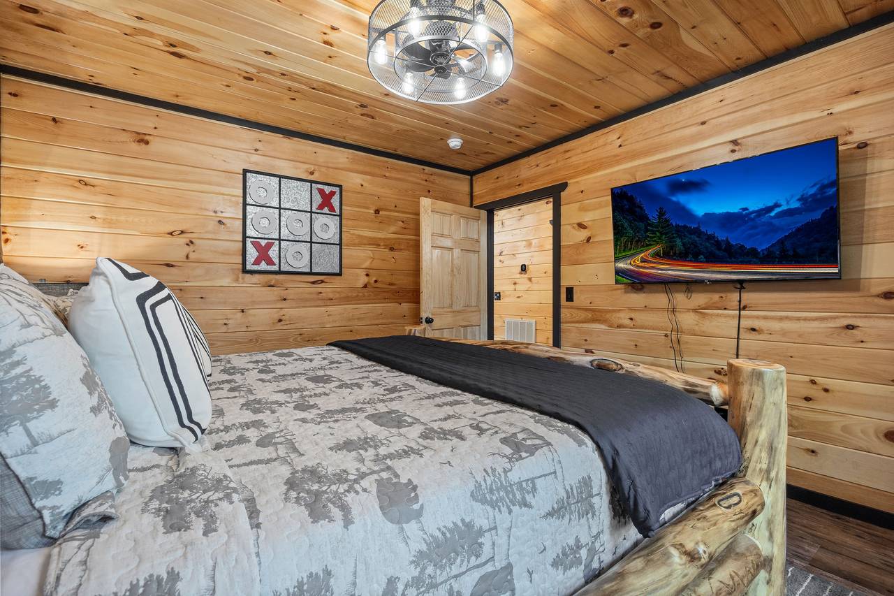 Entry level king bed with TV and shared full bath Entry level king bed with TV and shared full bath