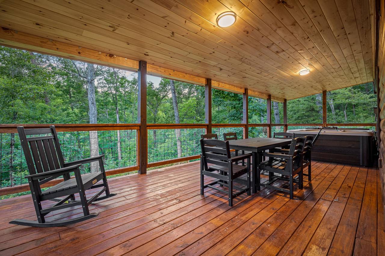 Outdoor dining, seating, and private hot tub. Outdoor dining, seating, and private hot tub.