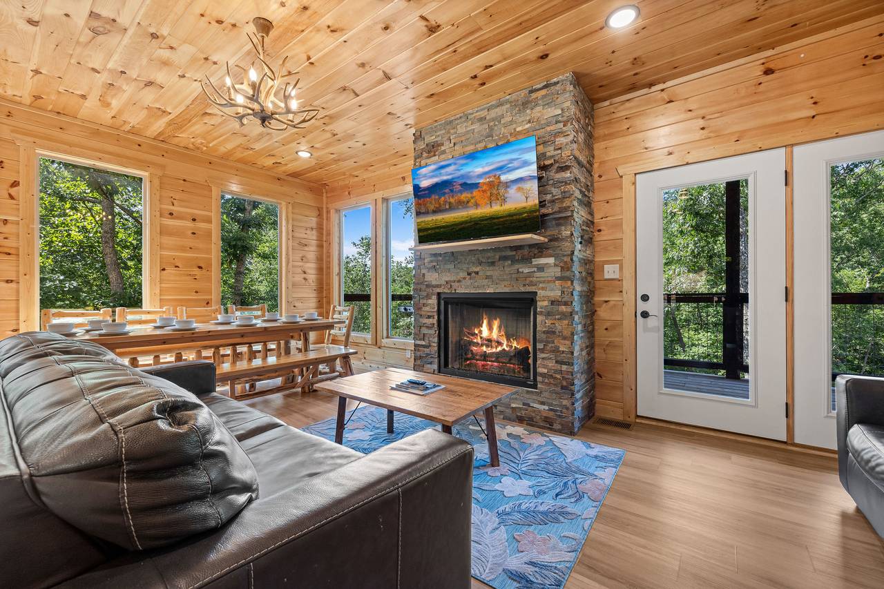 Living room with gas fireplace, TV, and comfy seating! Living room with gas fireplace, TV, and comfy seating!