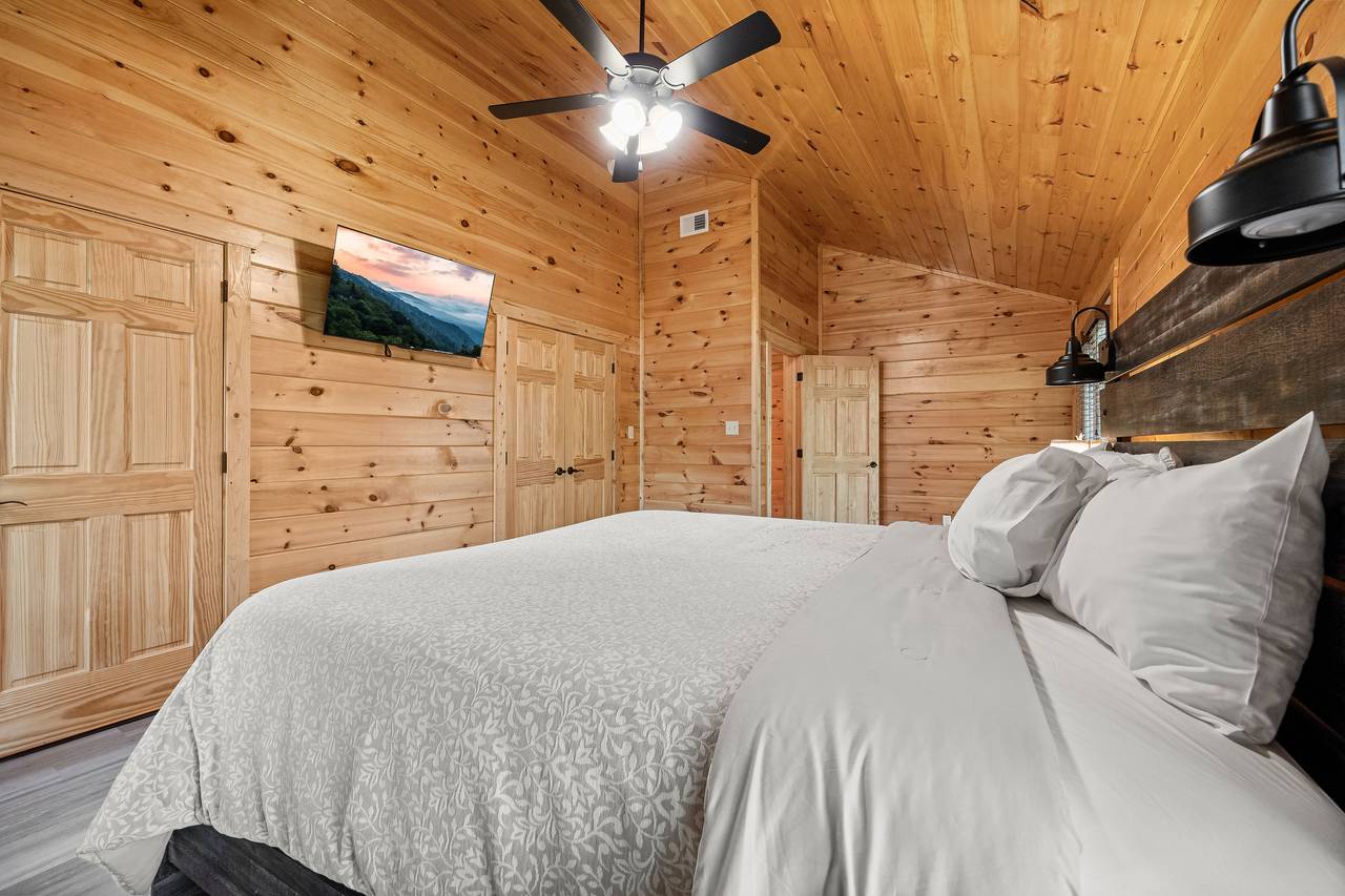 3rd upper level king with TV and shared ensuite full bath 3rd upper level king with TV and shared ensuite full bath