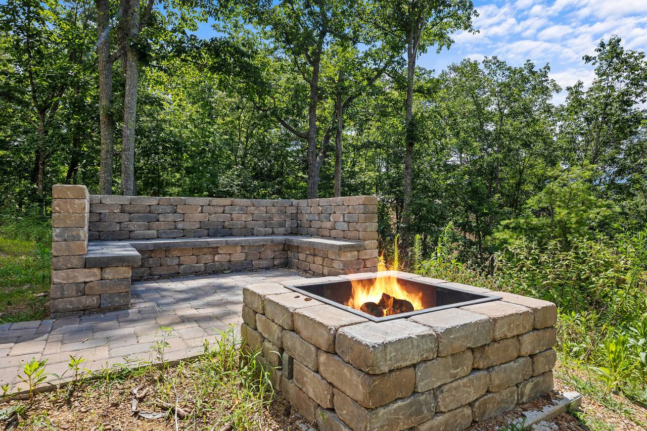 Gather around the outdoor natural wood fire pit for Smores! Gather around the outdoor natural wood fire pit for Smores!