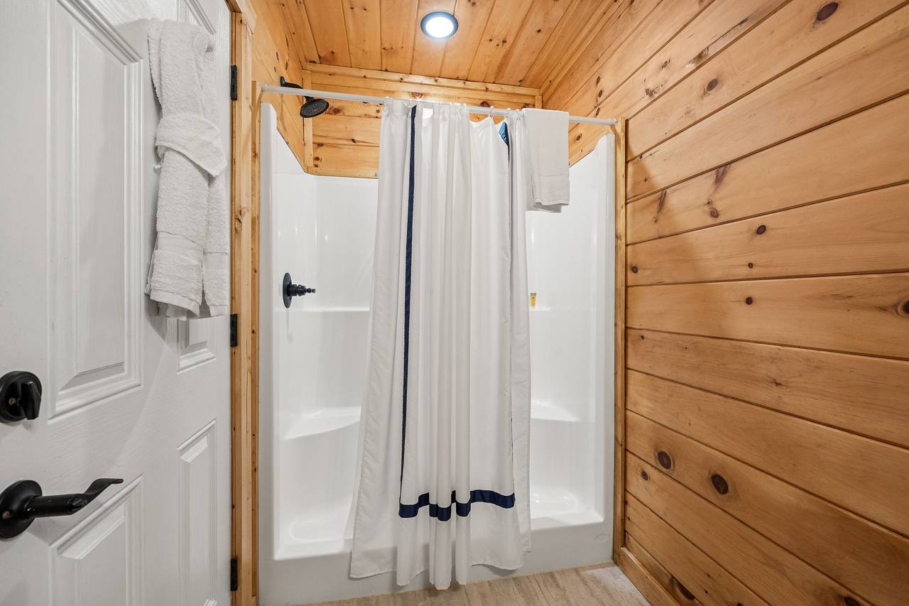 Full bath with standing shower on the lower level Full bath with standing shower on the lower level