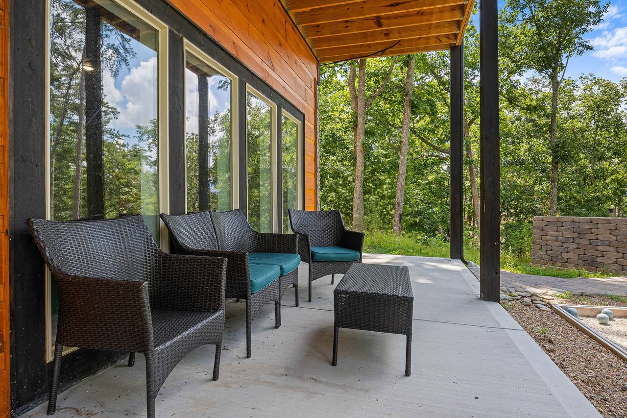 Lower patio seating and bocce ball court Lower patio seating and bocce ball court