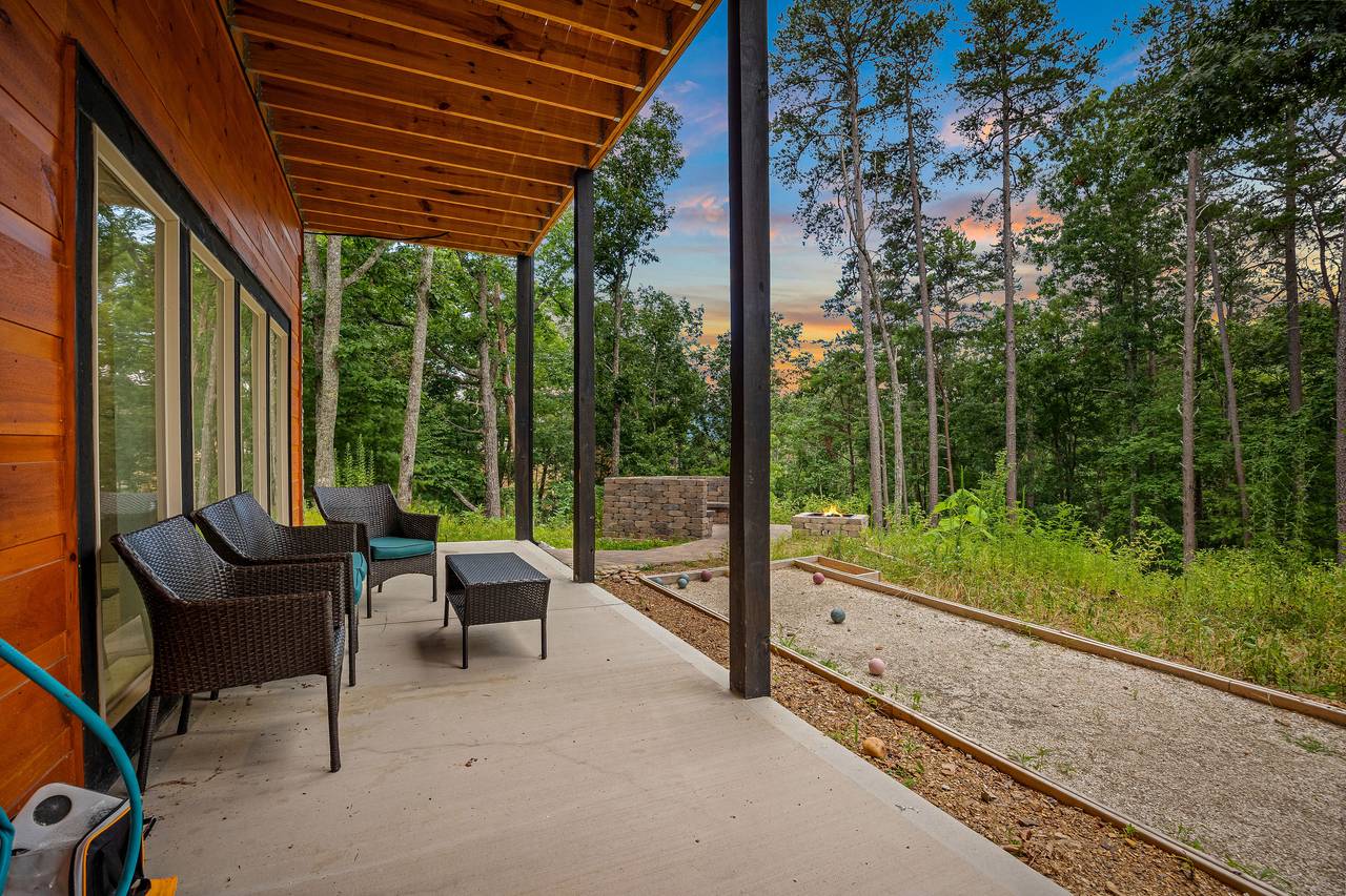 Lower level patio seating and bocce ball court Lower level patio seating and bocce ball court
