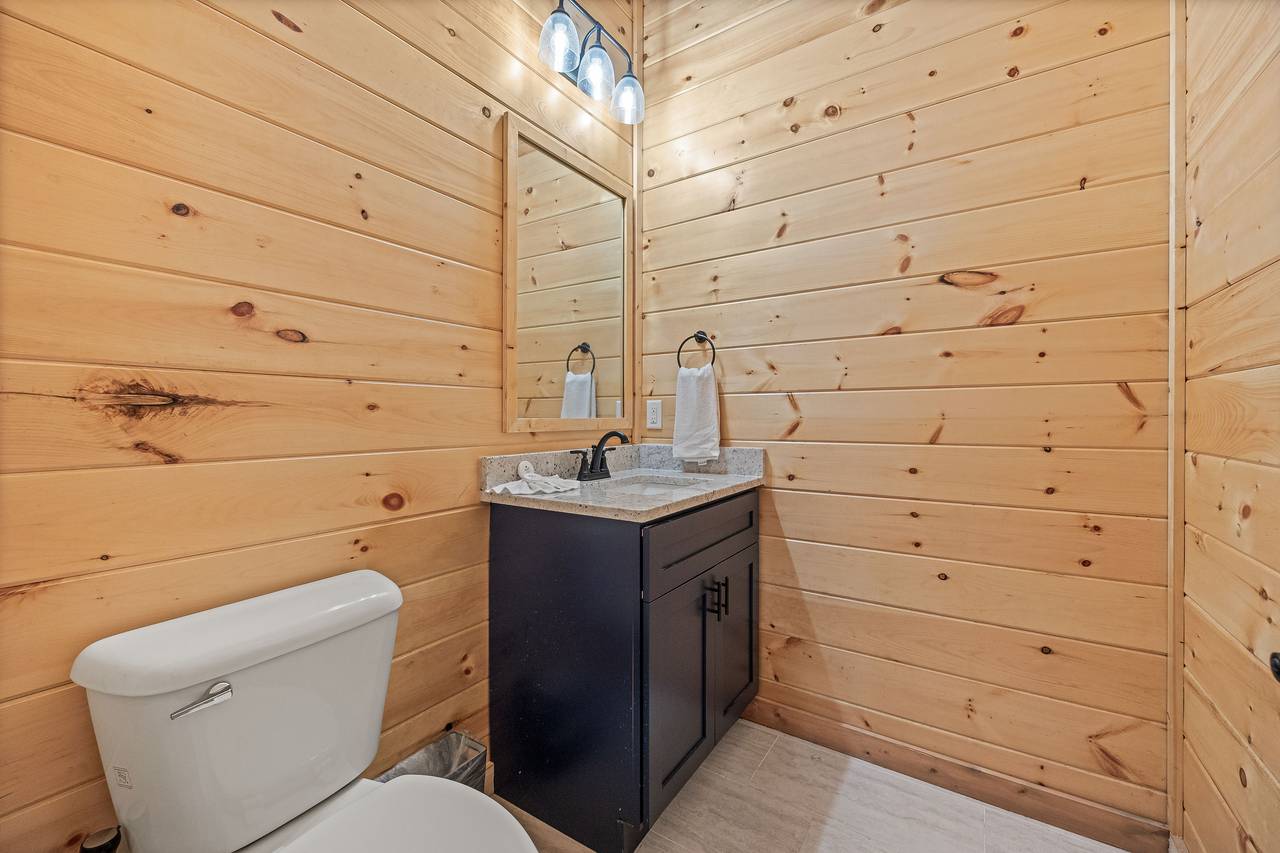 Half bath located by the theater room Half bath located by the theater room