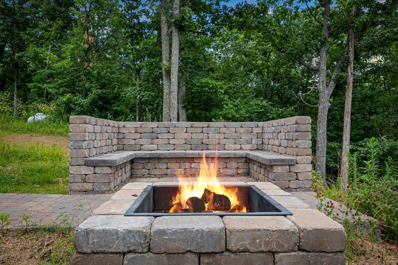 Gather around the outdoor natural wood fire pit for Smores! Gather around the outdoor natural wood fire pit for Smores!