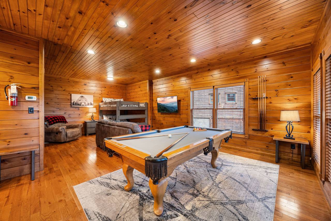 Game room with pool table, pinball, and multi-cade Game room with pool table, pinball, and multi-cade