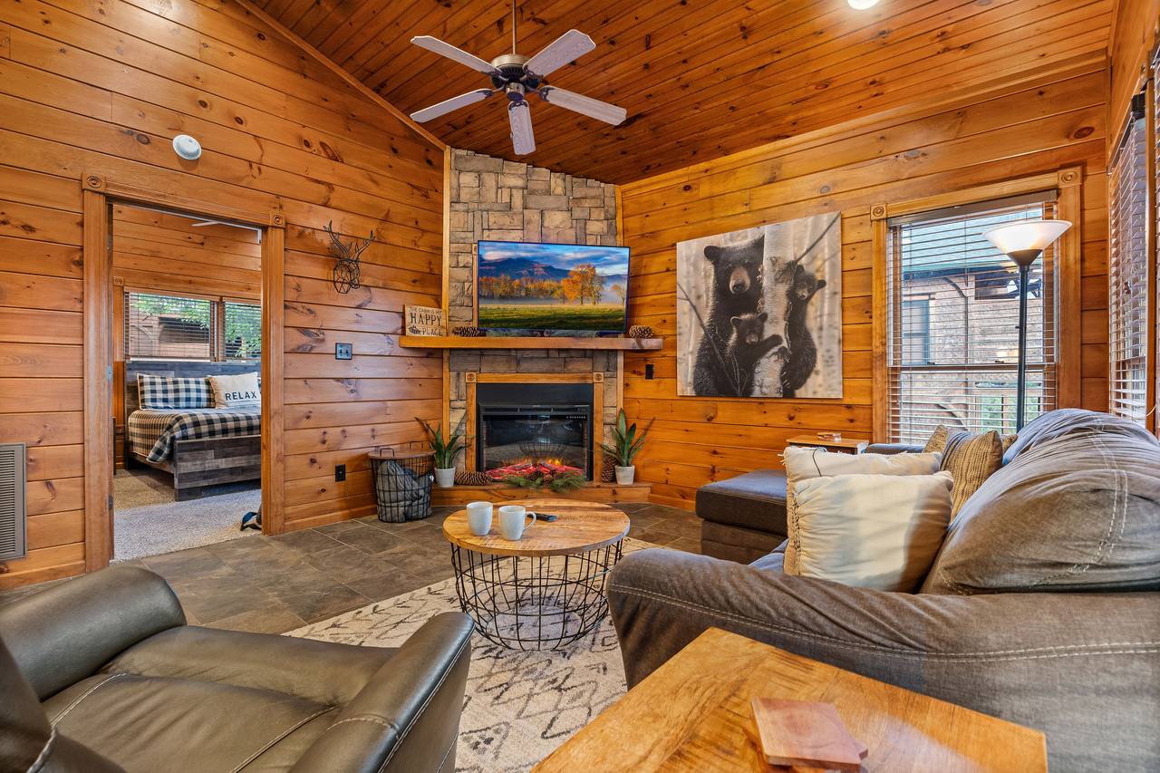 Entry level living room with fireplace, TV, and comfy seating! Entry level living room with fireplace, TV, and comfy seating!