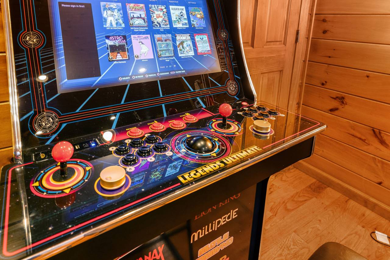 Lower level game room with pool table, pinball, and multi-cade Lower level game room with pool table, pinball, and multi-cade