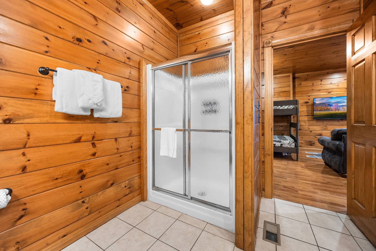 Lower level bathroom w/tanding shower & heart shaped jacuzzi Lower level bathroom w/tanding shower & heart shaped jacuzzi