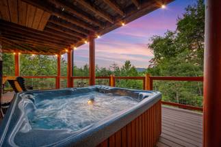 Private hot tub on deck with relaxing mountain scenery Private hot tub on deck with relaxing mountain scenery