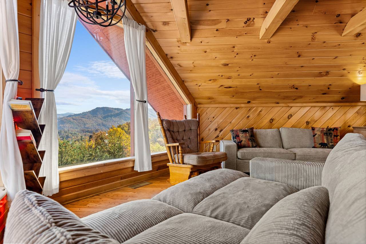Cozy loft with rocking chair, couch & comfy loveseat seating Cozy loft with rocking chair, couch & comfy loveseat seating