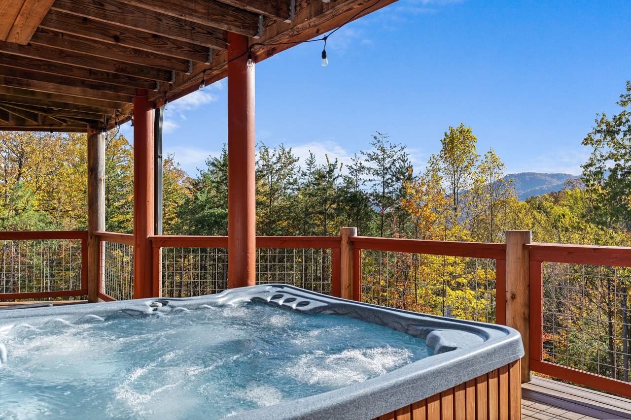 Private hot tub on deck with relaxing mountain scenery Private hot tub on deck with relaxing mountain scenery