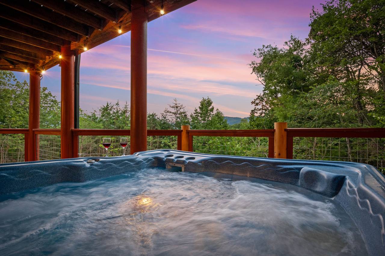 Private hot tub on deck with relaxing mountain scenery Private hot tub on deck with relaxing mountain scenery