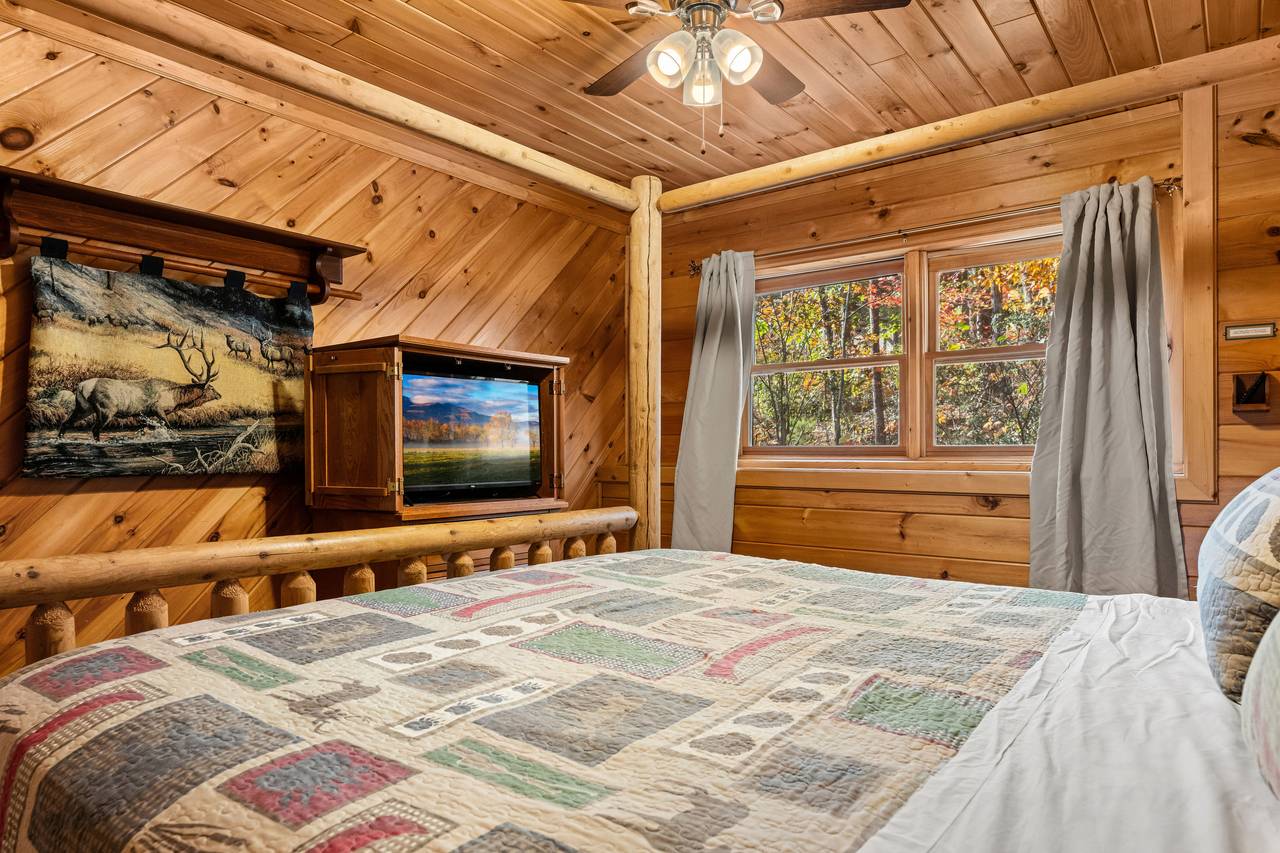 Lower level king bedroom near shared full bath Lower level king bedroom near shared full bath