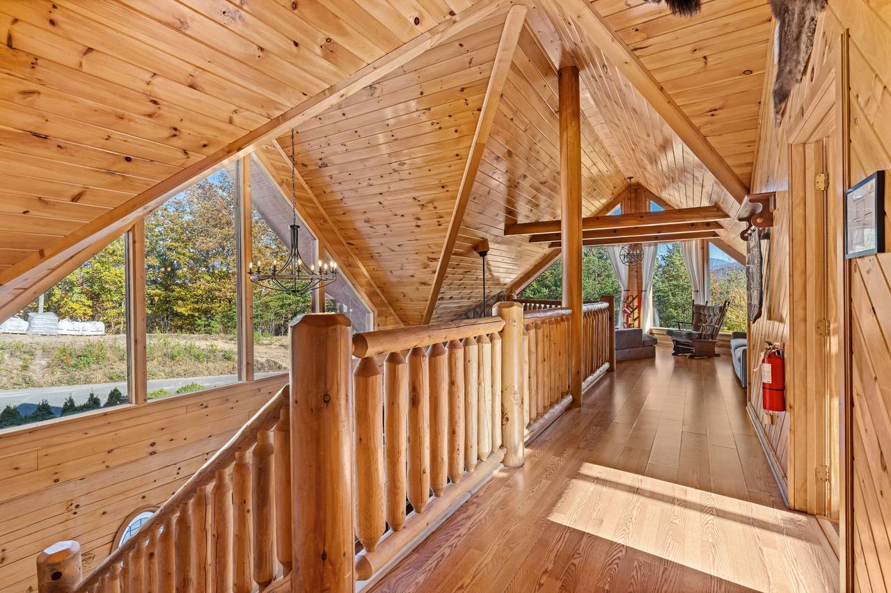 Open loft area overlooking living room below Open loft area overlooking living room below