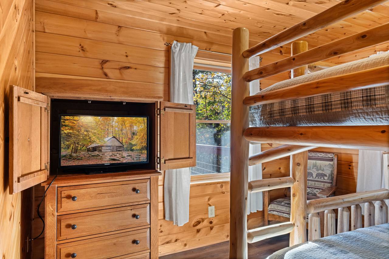 Queen-over-queen bunk room great for extra guests Queen-over-queen bunk room great for extra guests