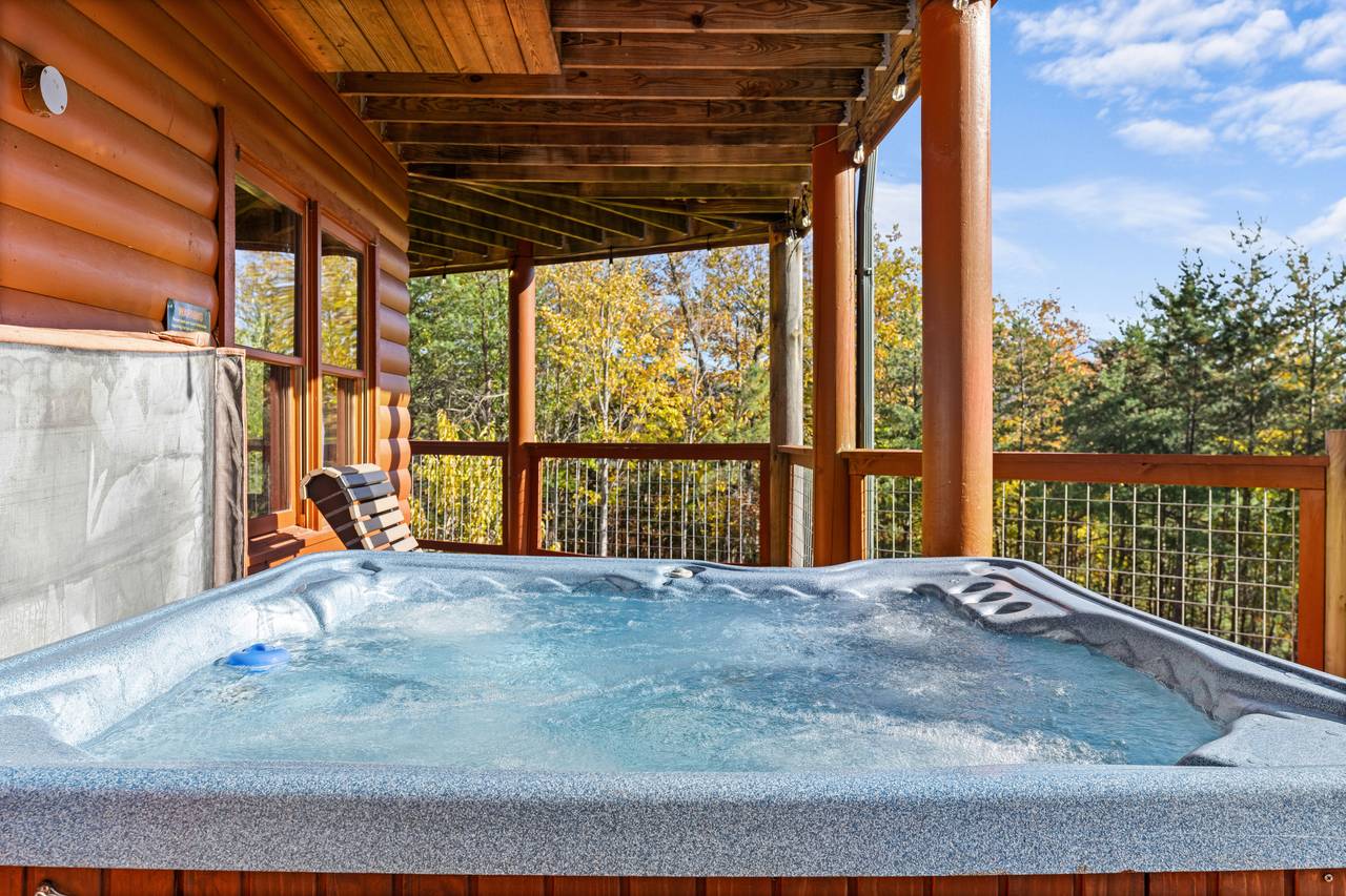 Private hot tub on deck with relaxing mountain scenery Private hot tub on deck with relaxing mountain scenery