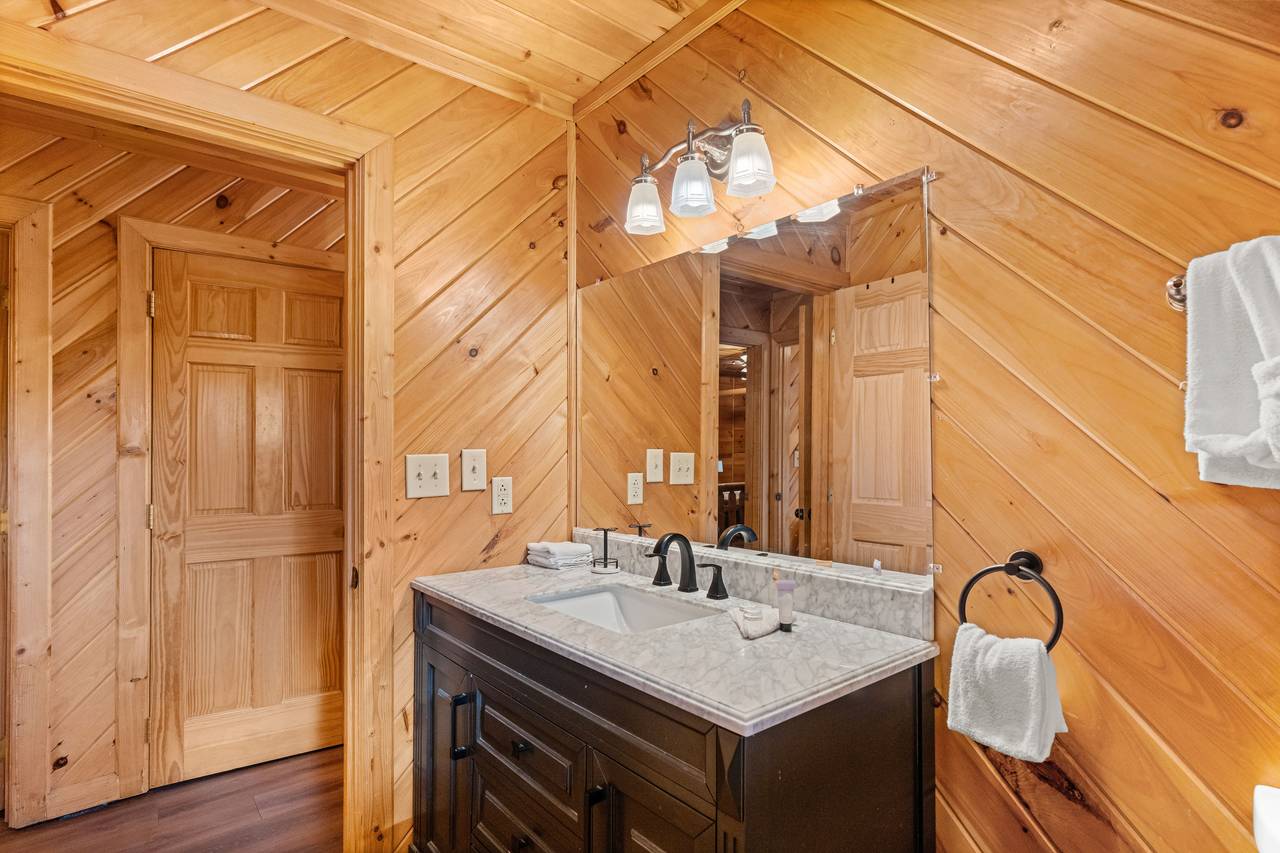 Lower level shared bath w/ walk-in shower Lower level shared bath w/ walk-in shower