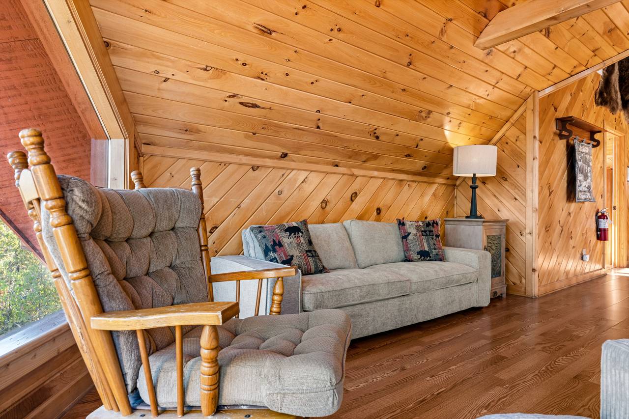 Cozy loft with rocking chair, couch & comfy loveseat seating Cozy loft with rocking chair, couch & comfy loveseat seating
