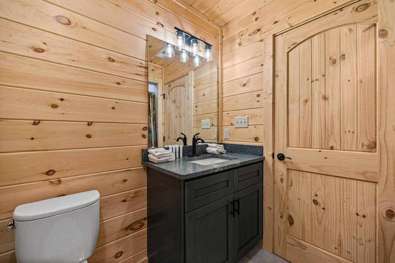 Upper level king ensuite full bath with standing shower Upper level king ensuite full bath with standing shower