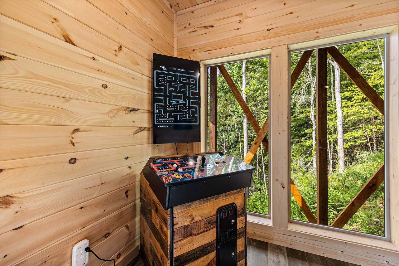 Game room with pool table, multi-cade arcade, & Golden Tee Game room with pool table, multi-cade arcade, & Golden Tee