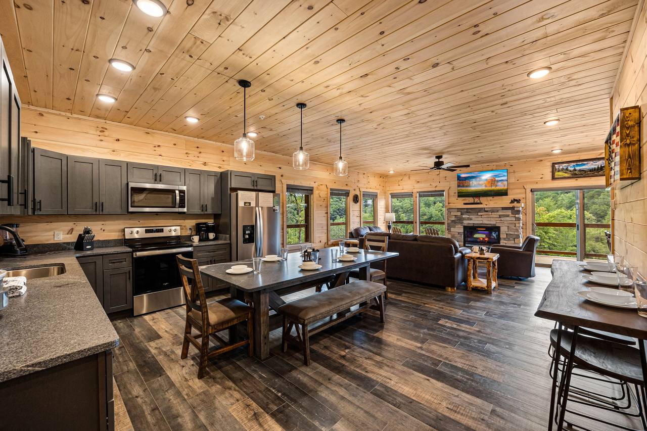 Entry level dining, kitchen, and living area Entry level dining, kitchen, and living area