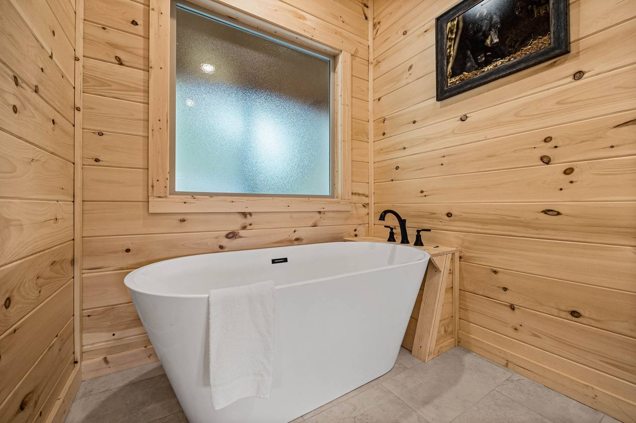Entry level ensuite full bath with standing shower & soaking tub Entry level ensuite full bath with standing shower & soaking tub