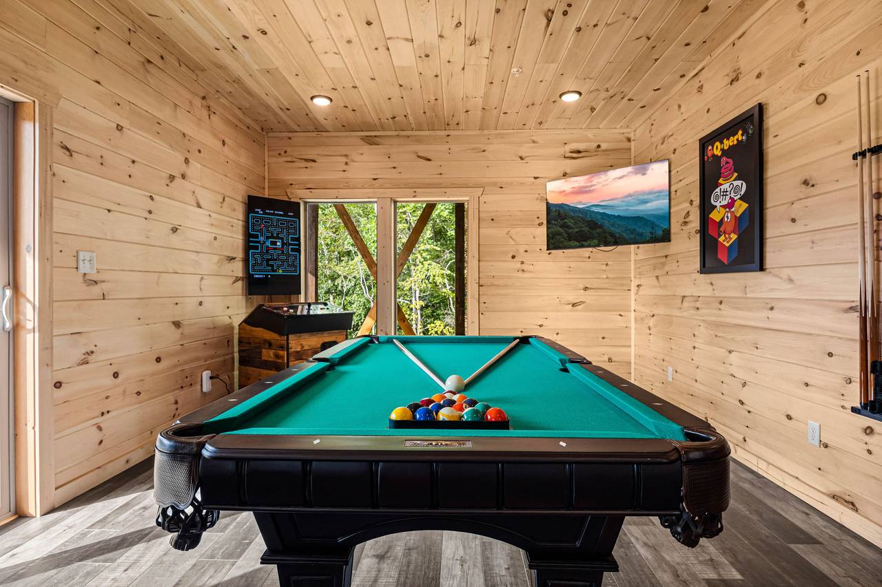 Game room with pool table, multi-cade arcade, & Golden Tee Game room with pool table, multi-cade arcade, & Golden Tee