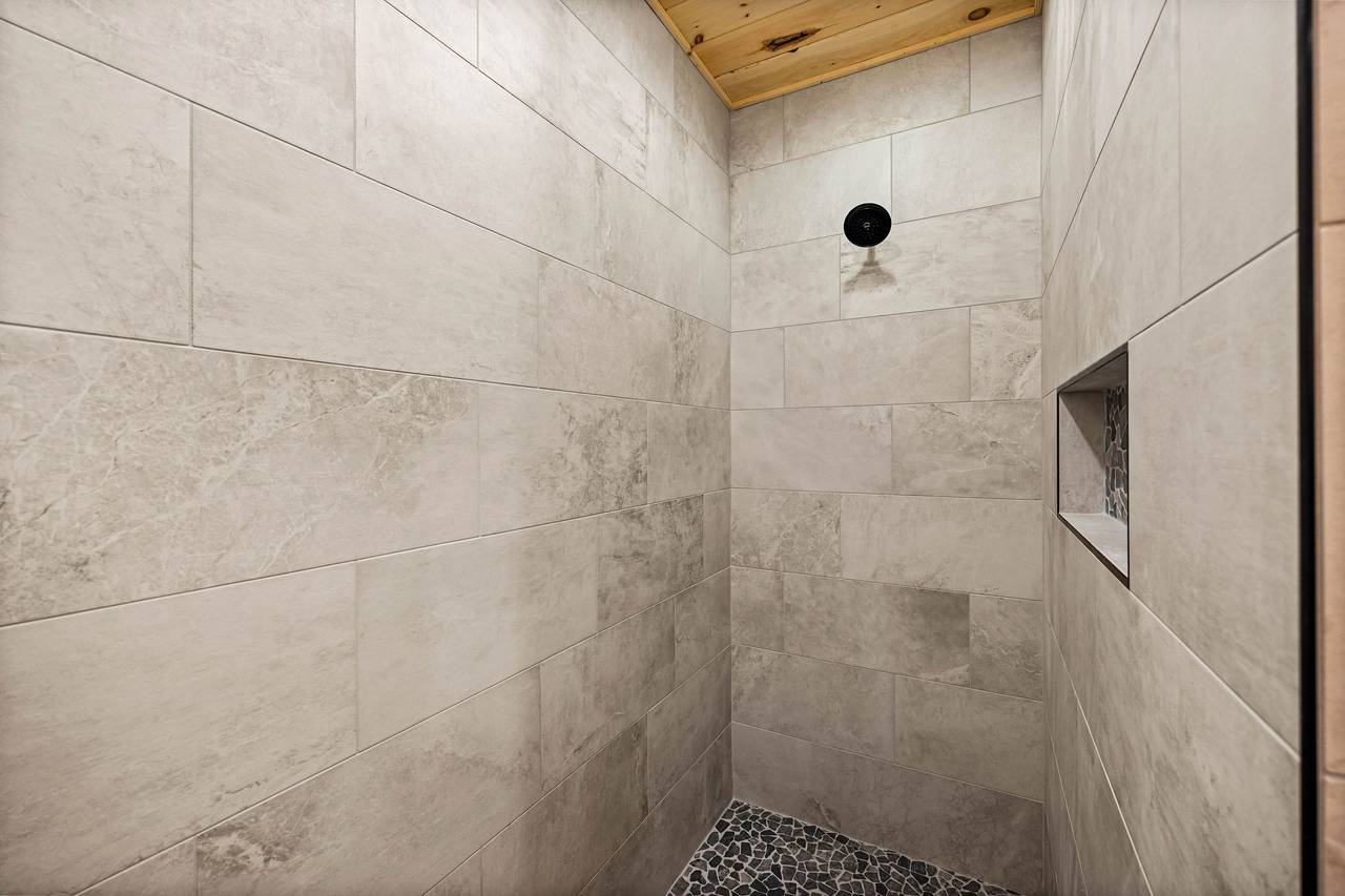 Entry level ensuite full bath with standing shower & soaking tub Entry level ensuite full bath with standing shower & soaking tub