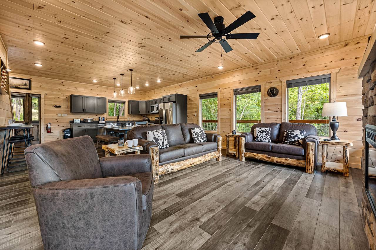 Spacious living room with queen sleeper sofa, TV, & fireplace Spacious living room with queen sleeper sofa, TV, & fireplace