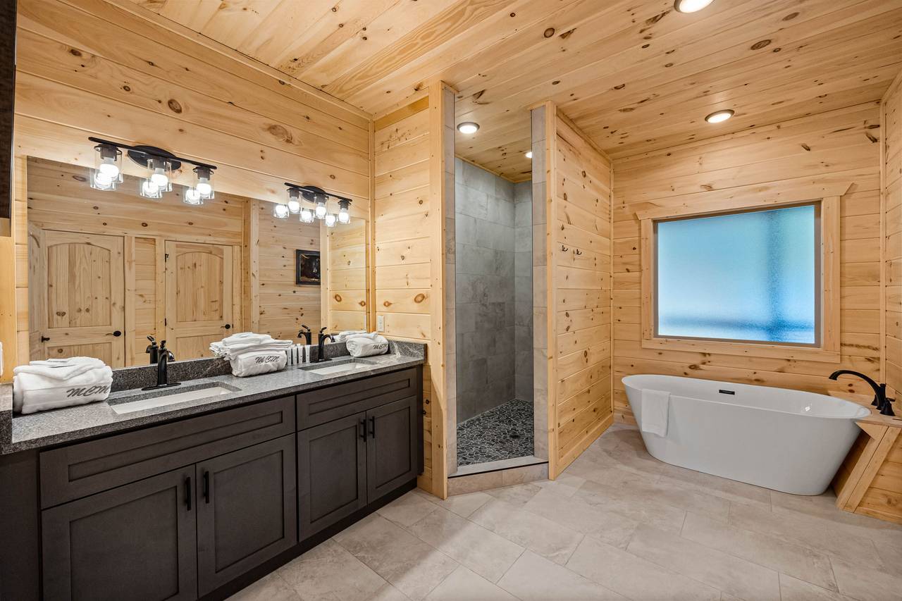 Entry level ensuite full bath with standing shower & soaking tub Entry level ensuite full bath with standing shower & soaking tub