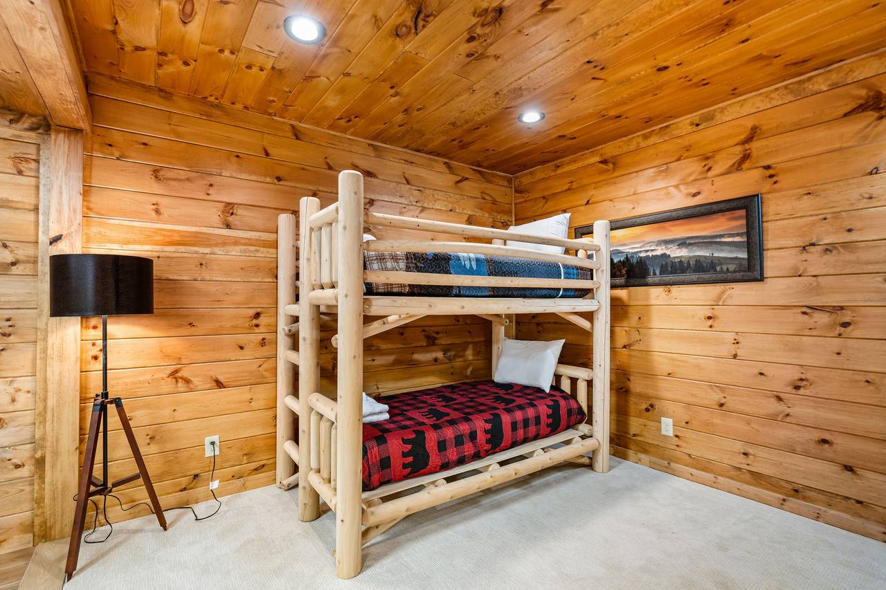 Bottom level twin over twin bunk beds and game room Bottom level twin over twin bunk beds and game room