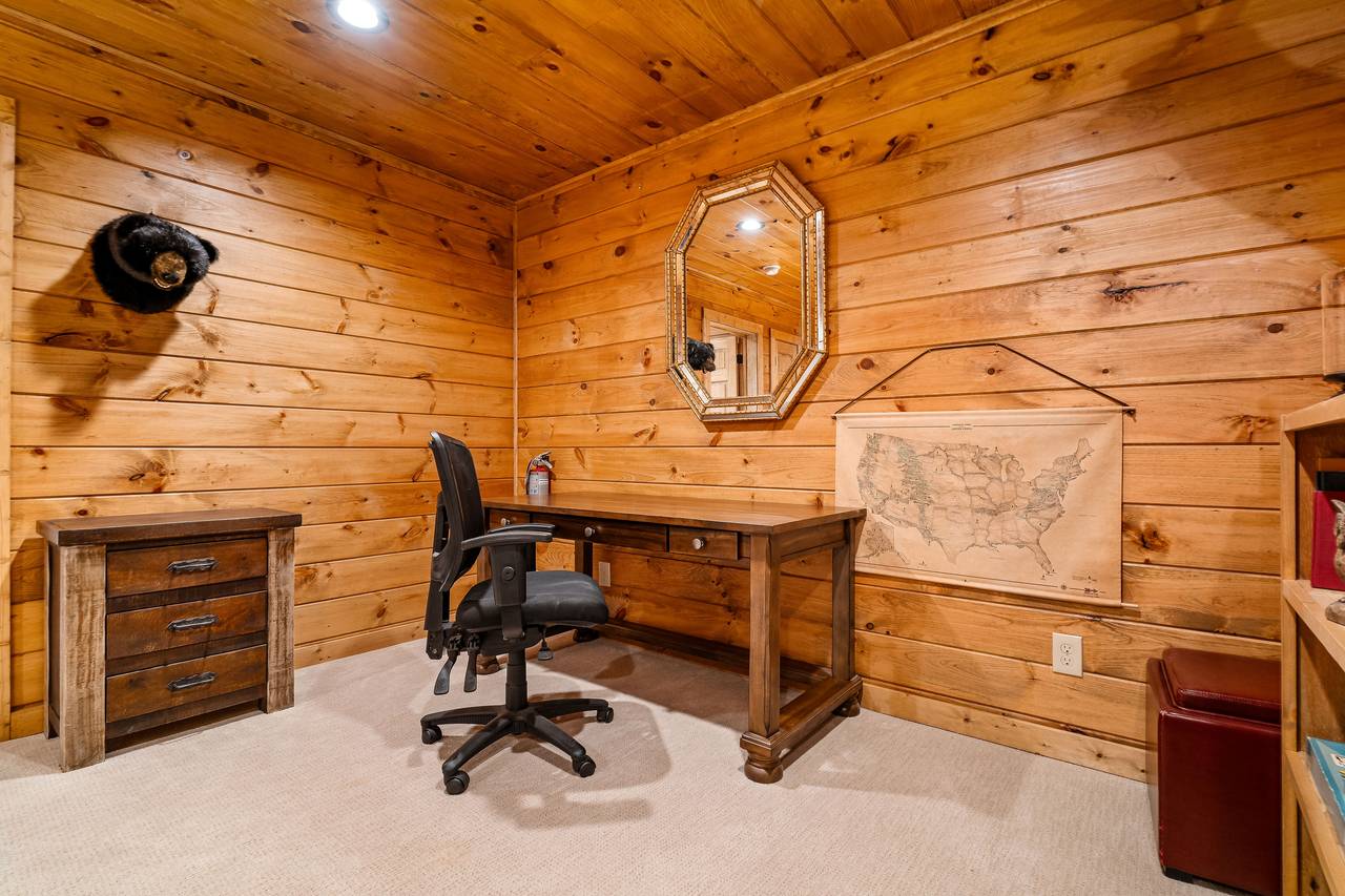 Lower level reading area w/remote work space desk & chair Lower level reading area w/remote work space desk & chair