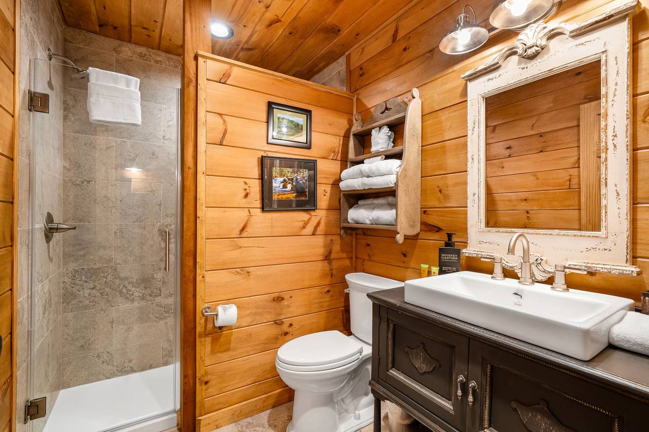 Lower level king ensuite full bath with standing shower Lower level king ensuite full bath with standing shower