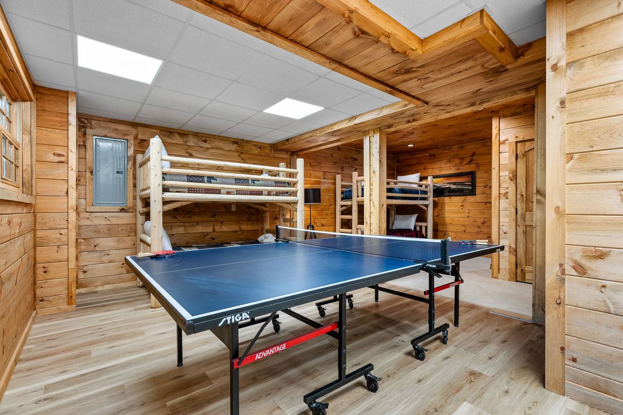 Bottom level twin/twin bunk beds & game room, ping pong Bottom level twin/twin bunk beds & game room, ping pong