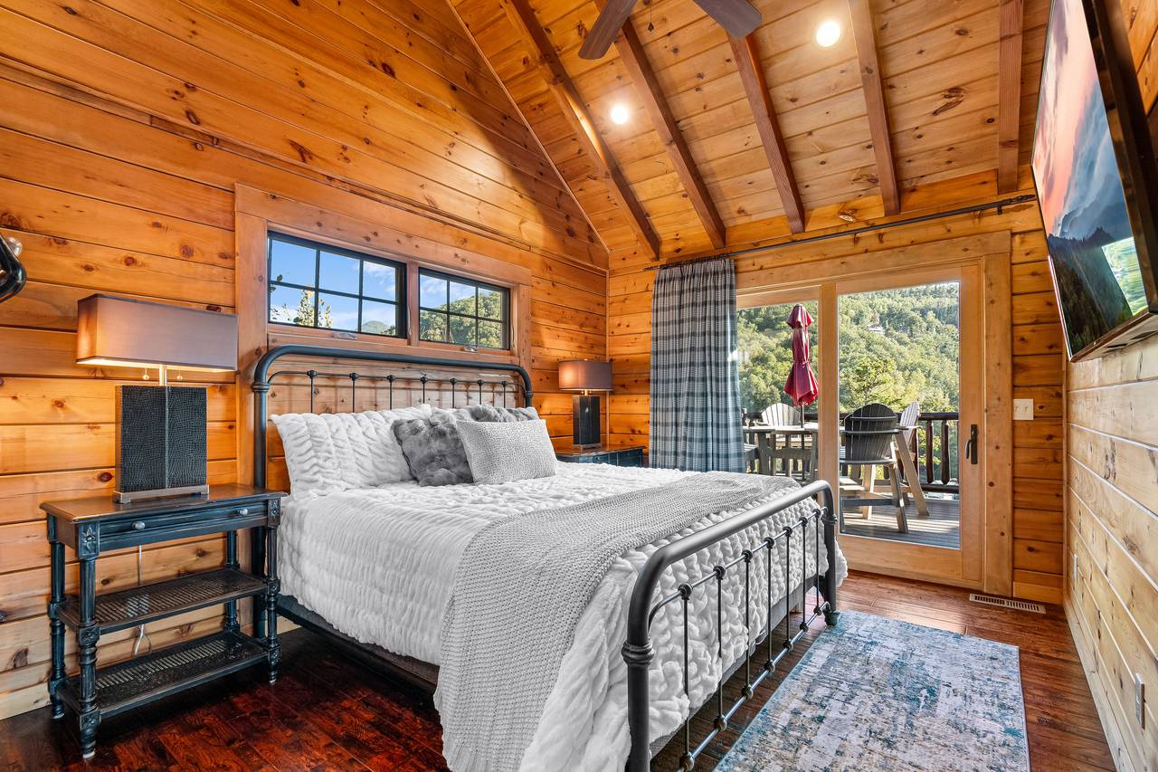 Entry level with king bed, TV, and ensuite full bathroom Entry level with king bed, TV, and ensuite full bathroom