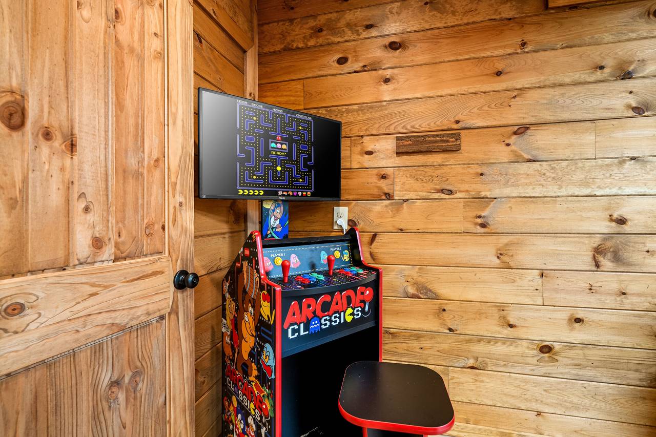 Game room with treadmill, ping pong, & 2 multi-cade arcades Game room with treadmill, ping pong, & 2 multi-cade arcades