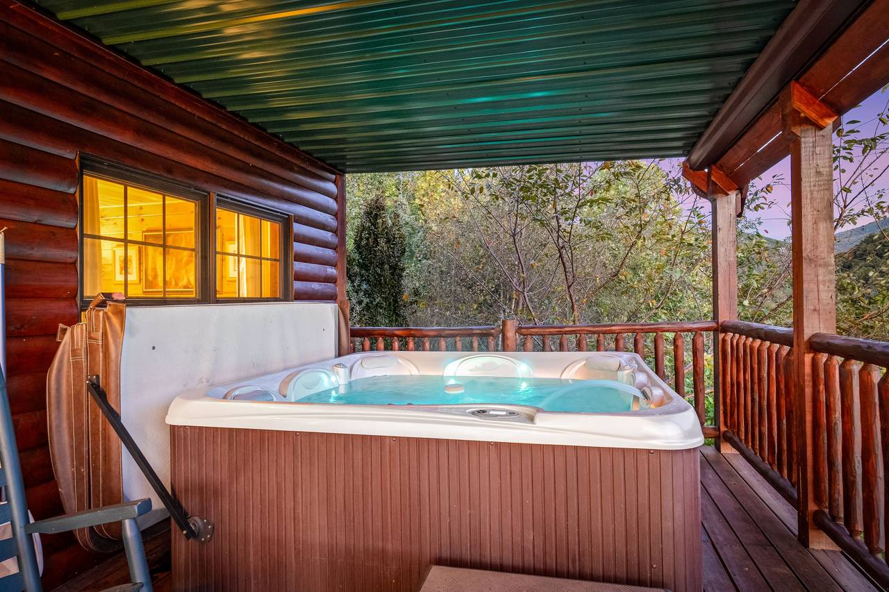Soak your cares away in the private hot tub on the deck! Soak your cares away in the private hot tub on the deck!