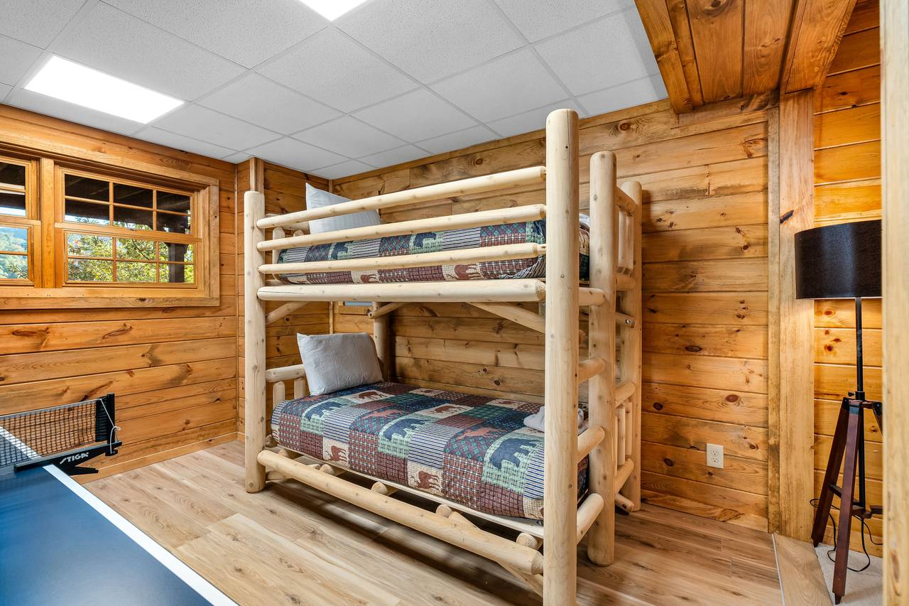 Bottom level twin over twin bunk beds and game room Bottom level twin over twin bunk beds and game room