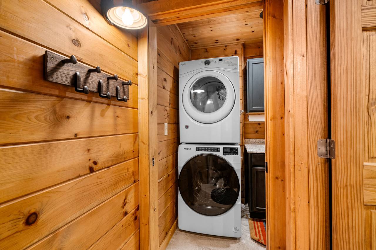 Lower level washing machie and dryer in large wash room Lower level washing machie and dryer in large wash room