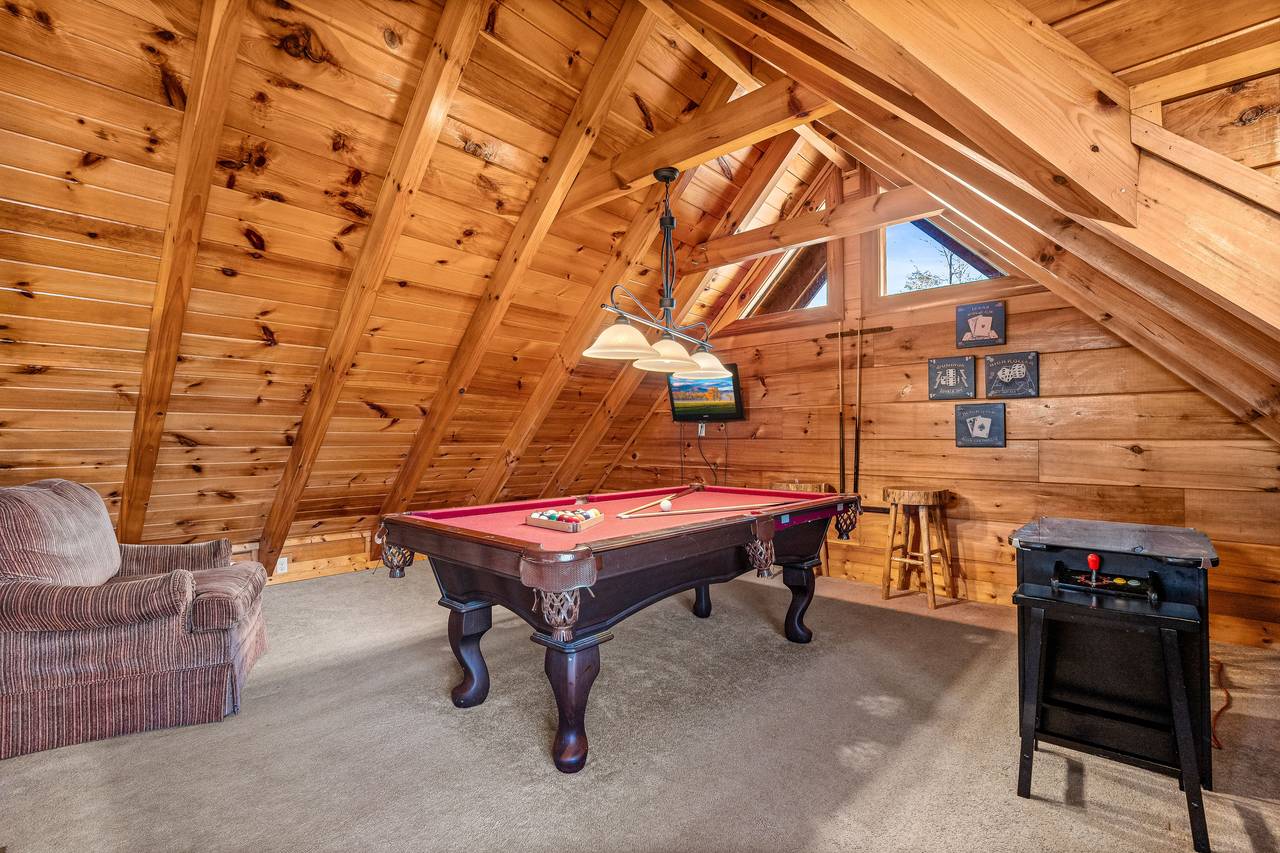 Loft with game room: TV, pool table, & arcade game Loft with game room: TV, pool table, & arcade game