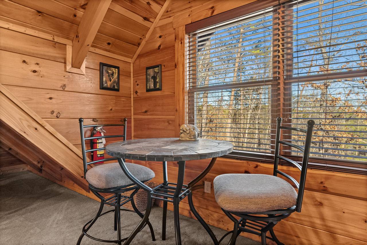 Upper level loft with game room: pool table & arcade game Upper level loft with game room: pool table & arcade game