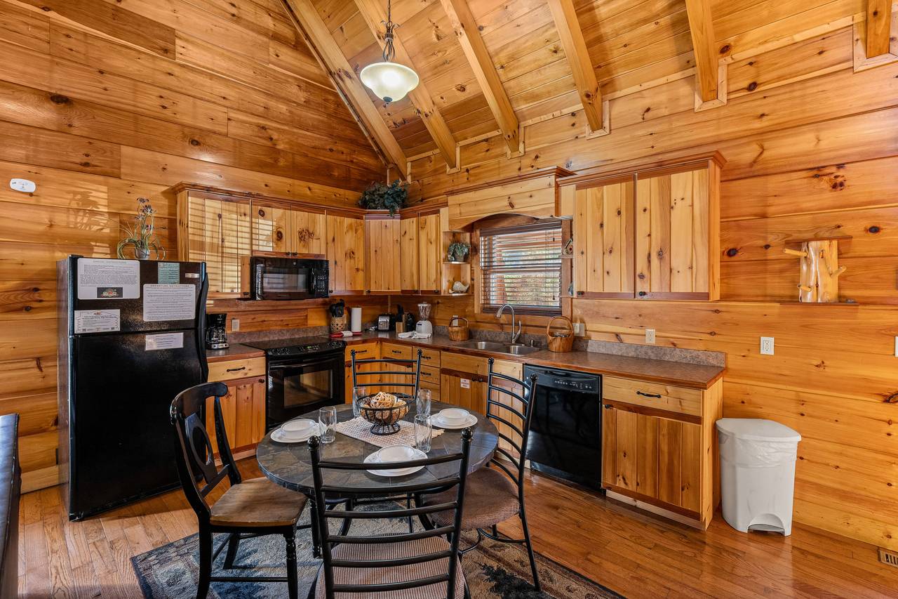 Fully equipped kitchen and dining area Fully equipped kitchen and dining area
