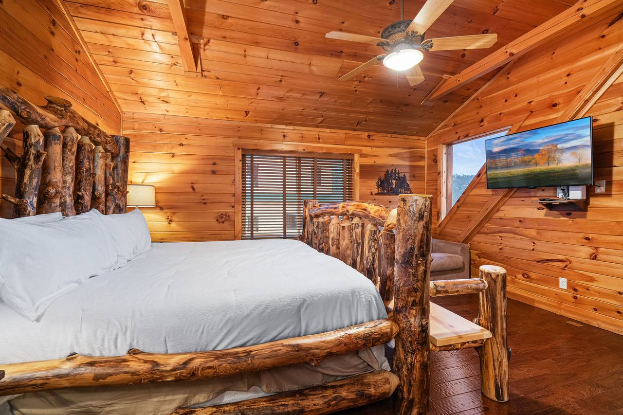 Upper level king with TV and comfy seating. Upper level king with TV and comfy seating.