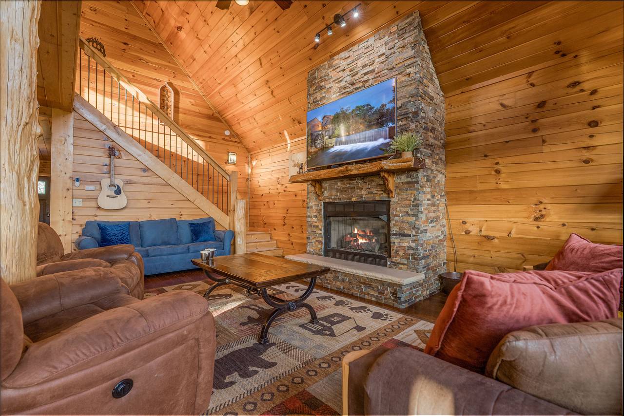 Spacious living room with fireplace, 2 sleeper sofas, & TV. Spacious living room with fireplace, 2 sleeper sofas, & TV.